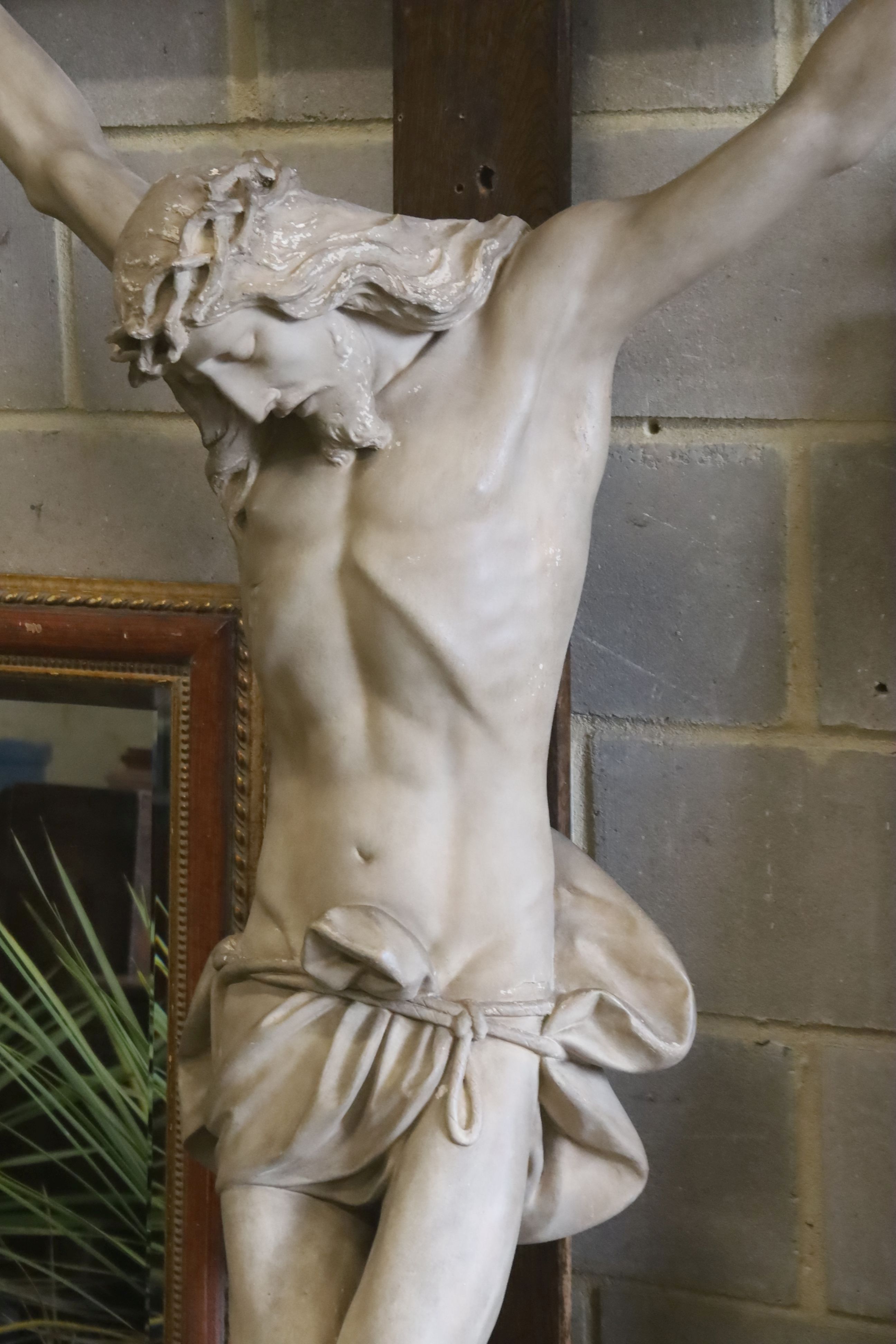 A large composition and oak crucifix, width 126cm, height 218cm
